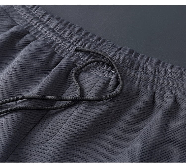 Męski komplet z kurtką i spodniami dresowymi na zamek – subtelna powierzchnia i wąski krój nogawek 1