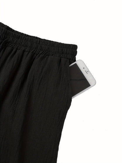 Spodnie męskie z elastycznym paskiem – wygodne i przewiewne na ciepłe dni