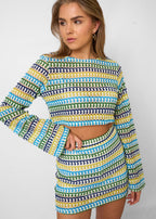 Zestaw damski – Crop top z długim rękawem i mini spódnicą