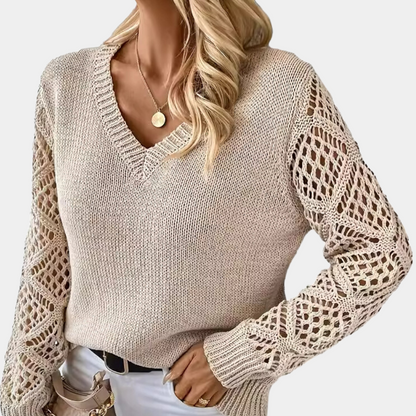 Damski sweter dzianinowy z dekoltem w serek i koronkowymi rękawami – elegancja i komfort